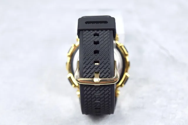 Casio G-Shock GA-110 Montre Sportive Ton Doré et Noir 6