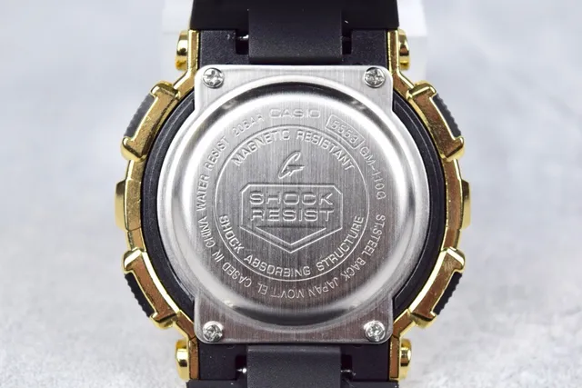 Casio G-Shock GA-110 Montre Sportive Ton Doré et Noir 7