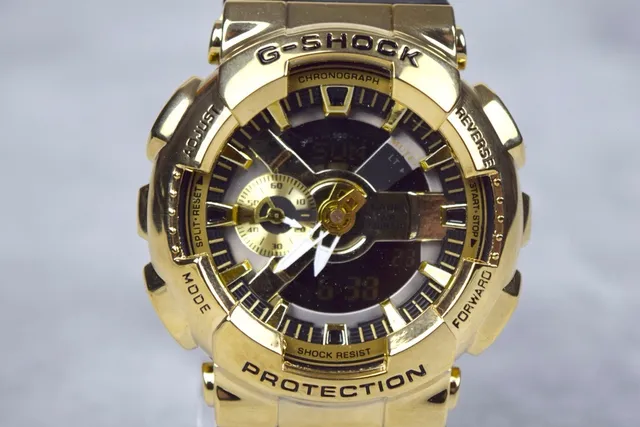 Casio G-Shock GA-110 Montre Sportive Ton Doré et Noir 8