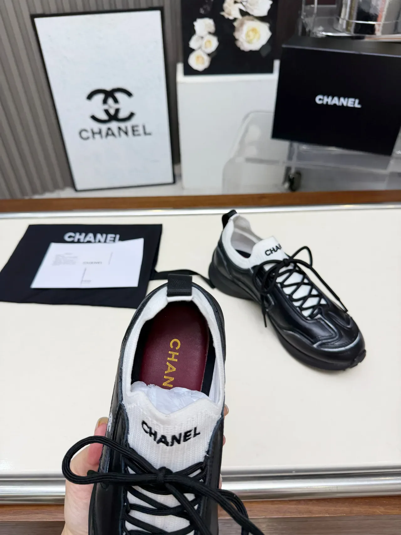 Chanel Runner-Style Sneaker Black and White Leather Lifestyle Sneakers 2