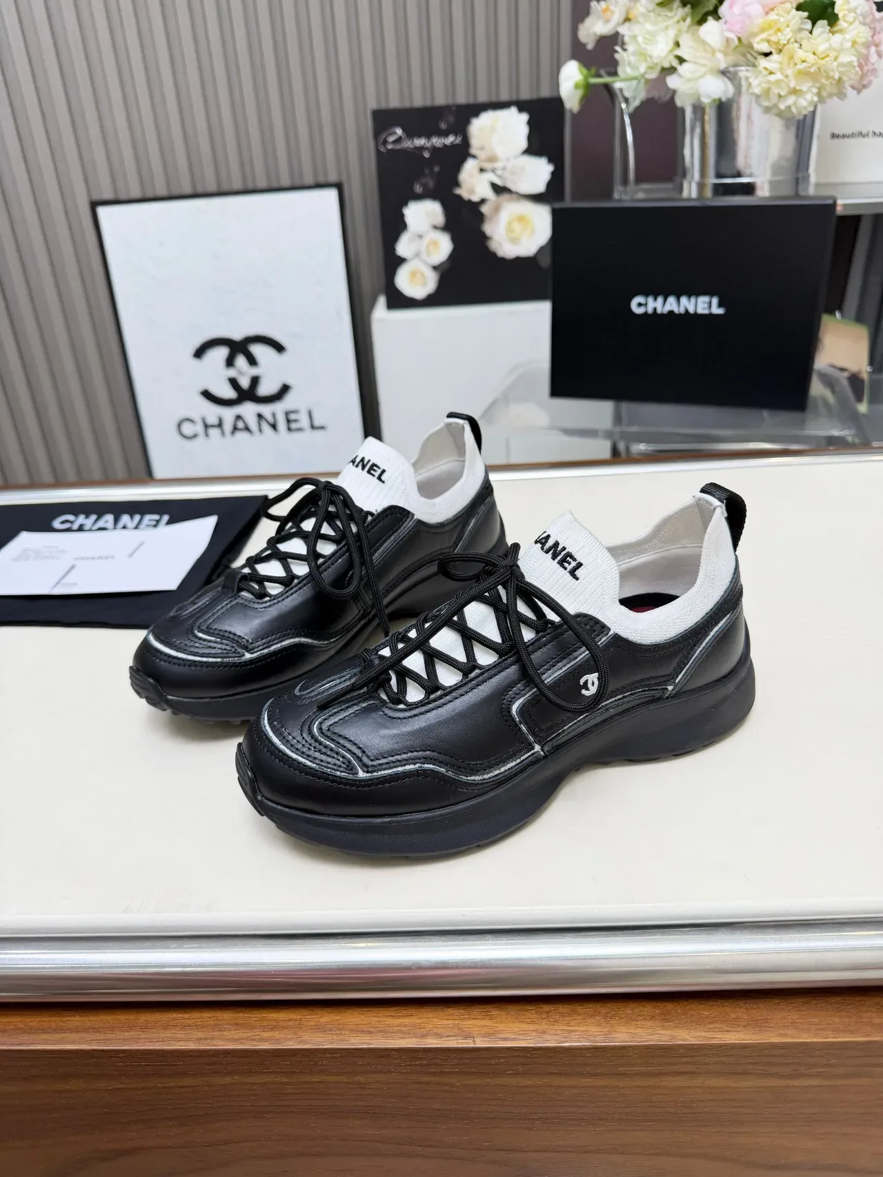 Chanel Runner-Style Sneaker Black and White Leather Lifestyle Sneakers 3
