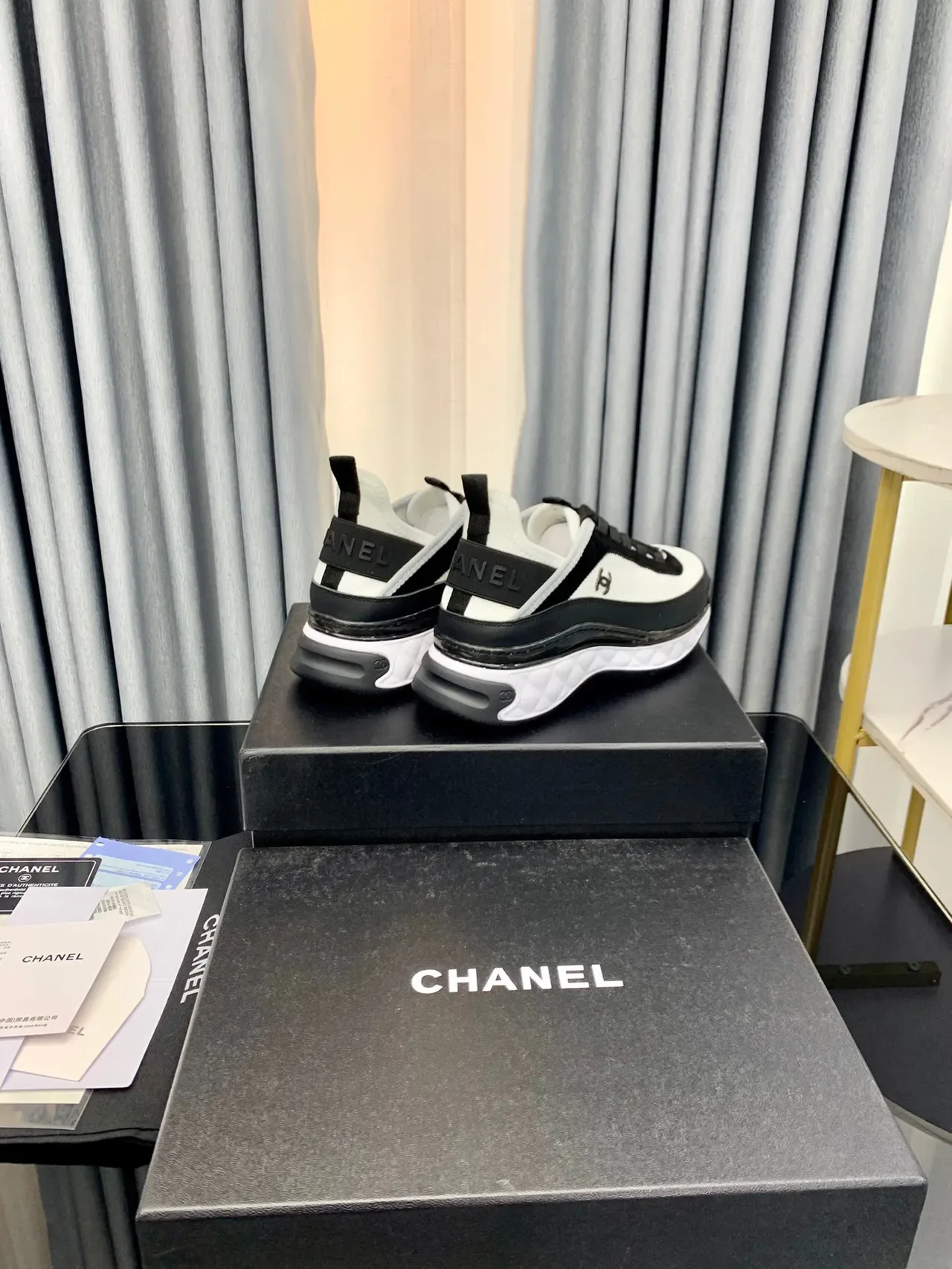 Chanel White Black Quilted Midsole Zippered Side Panel Lifestyle Sneakers 7