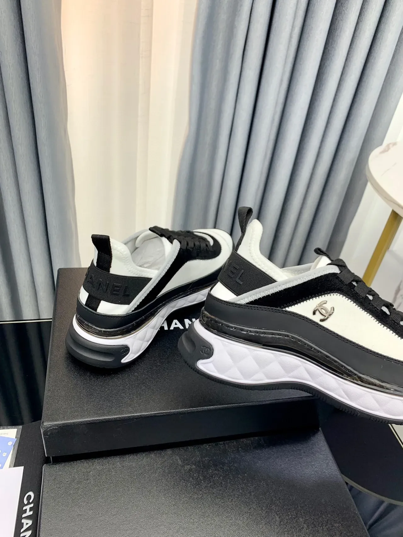 Chanel White Black Quilted Midsole Zippered Side Panel Lifestyle Sneakers 8