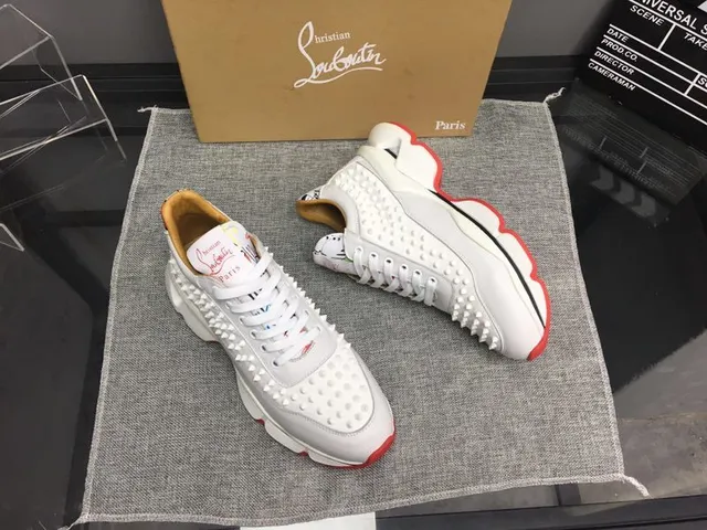 Christian Louboutin Sneakers chunky avec empeigne cuir blanc et rouge clouté, semelle sculptée 2