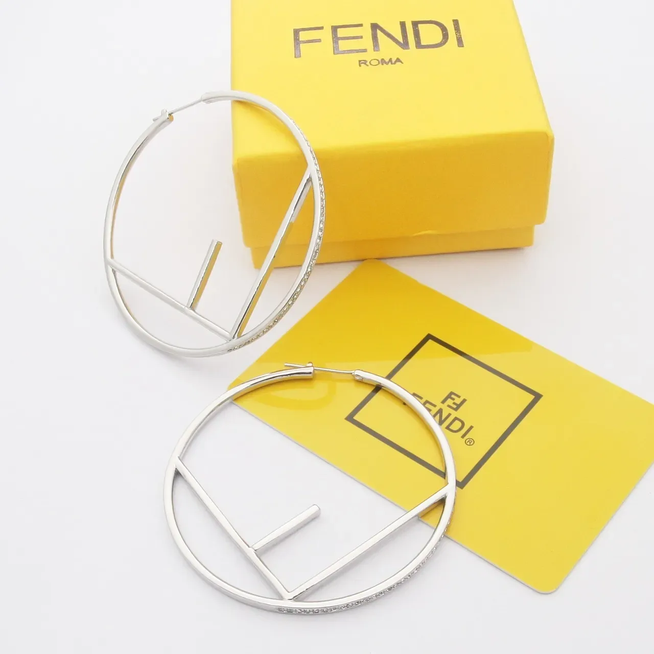 Fendi FF Hoop brincos aro dourados prateados motivo geométrico abertos 4