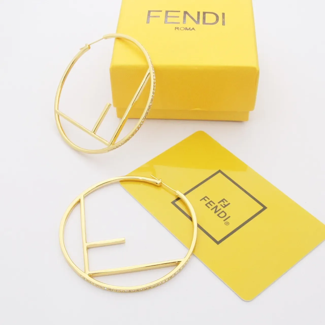Fendi FF Hoop brincos aro dourados prateados motivo geométrico abertos 6