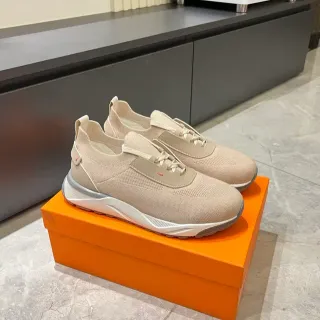 Zapatillas beige y blanco con upper de knit y midsole sculptada