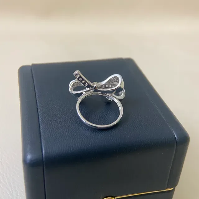 Bow-Shaped Baguette and Pavé Stone Ring 5
