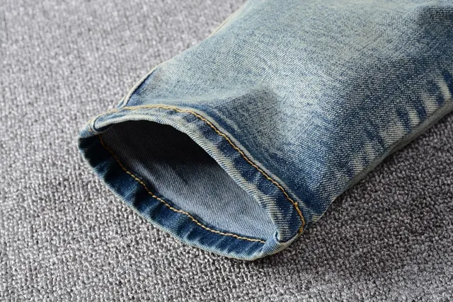 Distressed Light-Wash Moto-Style Jeans 6