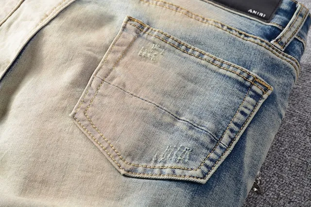 Distressed Light-Wash Moto-Style Jeans 9