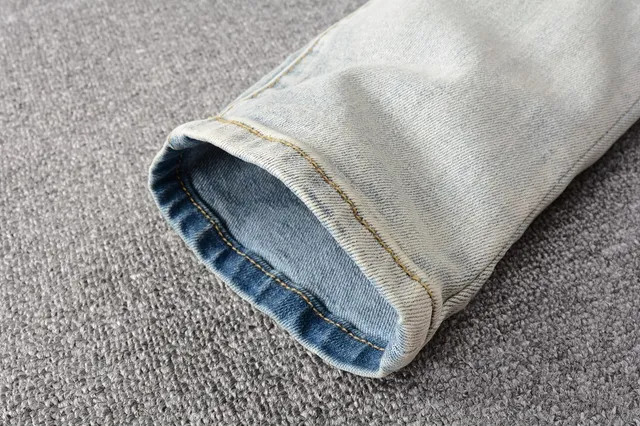 Distressed Light-Wash Slim-Fit Ripped Jeans 13
