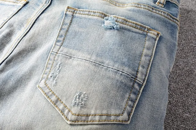 Distressed Light-Wash Slim-Fit Ripped Jeans 15