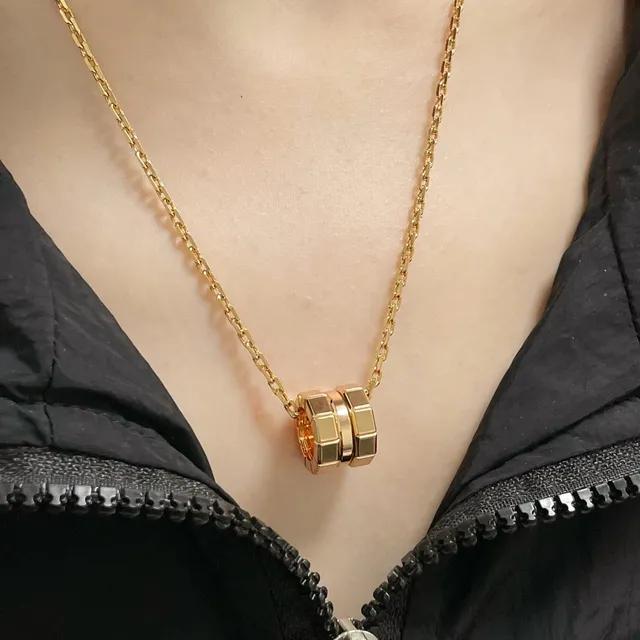 Gold and Silver Faceted Hexagonal Multi-Ring Pendant Necklaces 9