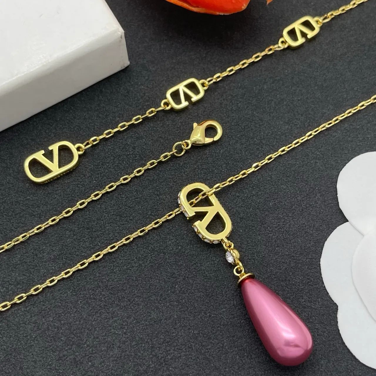 Gold Pink Chain Stylized Logo Pendant Necklace 4