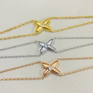 Colgante X de Oro y Plata con Piedra Simple en el Centro Brazalete