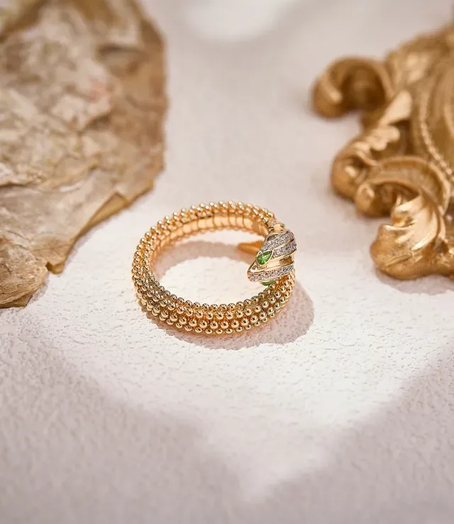 Gold Snake-Inspired Pavé Diamond and Green Gem Ring 2