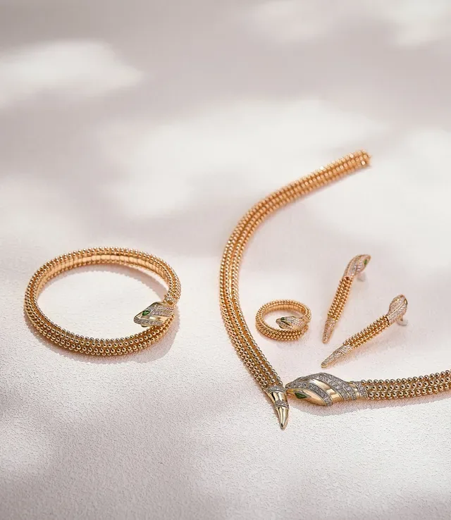 Gold Snake-Inspired Pavé Diamond and Green Gem Ring 4