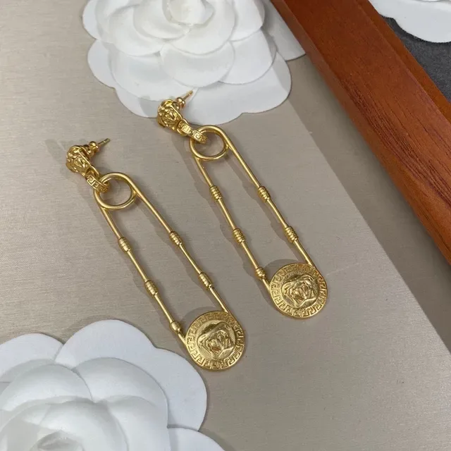 Gold-Tone Lion Head Greek Key Drop Earrings 6