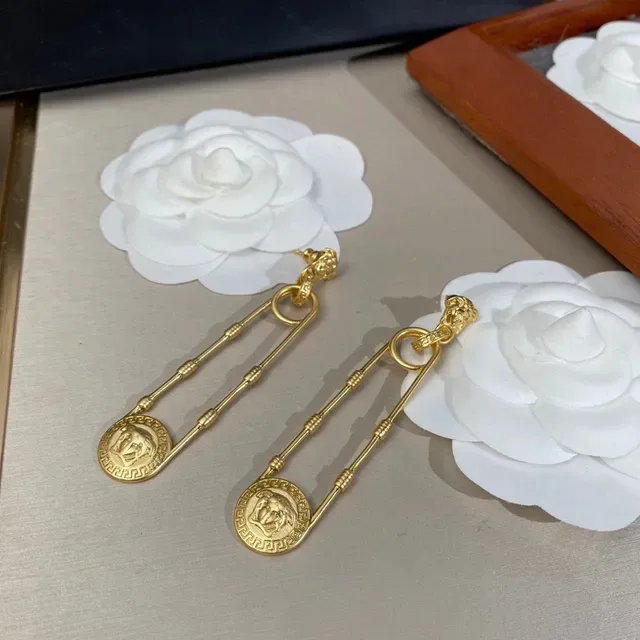Gold-Tone Lion Head Greek Key Drop Earrings 8