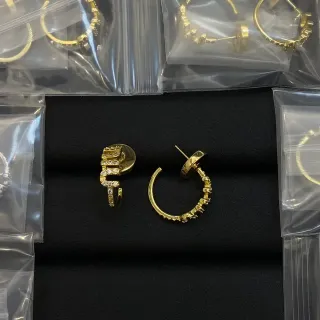Gold-Tone Pavé Crystal Asymmetrical Hoop Earrings