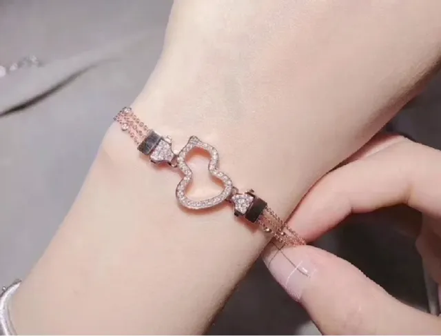 Gold-Tone Pavé Crystal Heart Motif Bracelet 9