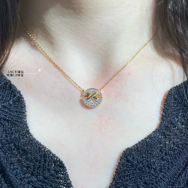 Gold-Tone Pavé X Motif Pendant Necklace 9