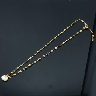 سلسلة ذهبية وبيضاء من الروابط مع حجر أوجه ناعم معلق