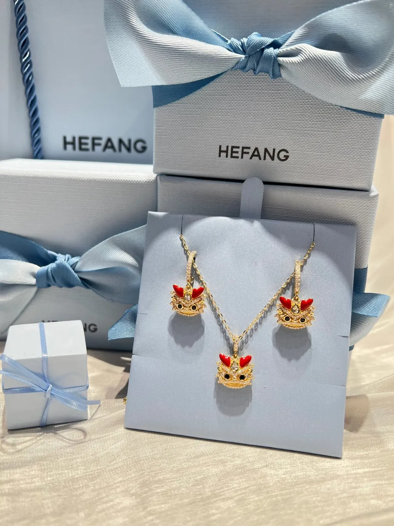 HEFANG Gold-Tone Red Enamel Crystal Figural Pendant Necklace 7