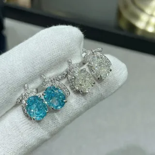 Oval Blue and Colorless Gemstone Pavé Diamond Bow Earrings