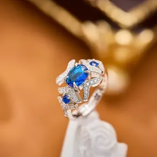 Oval Blue Sapphire and Diamond Pavé Sculpted Band Ring