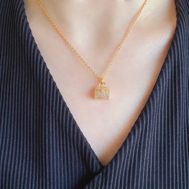 Pavé-Set Handbag-Shaped Pendant Gold-Tone Necklace 9