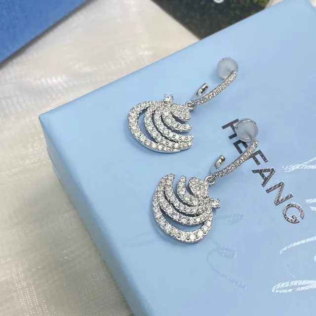 Pavé-Set Swirl Motif Dangling Earrings 9