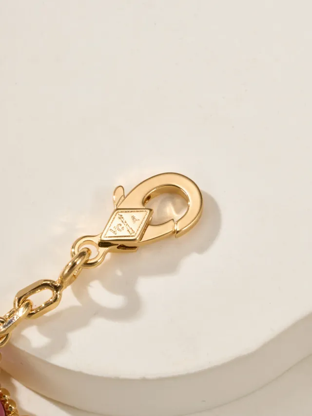 Pulseira de corrente de ouro rosa com cinco incrustações em forma de trevo 2