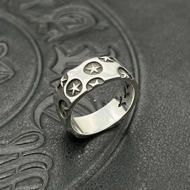 Silver Star and Circle Perforated Band Ring 6