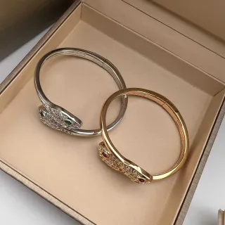 Brazaletes Cabeza de Serpiente Ojo Gemas Pavé Bisagra