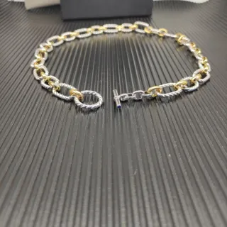 Pulseira de duas cores com elos de corda trançada e fecho de palanca