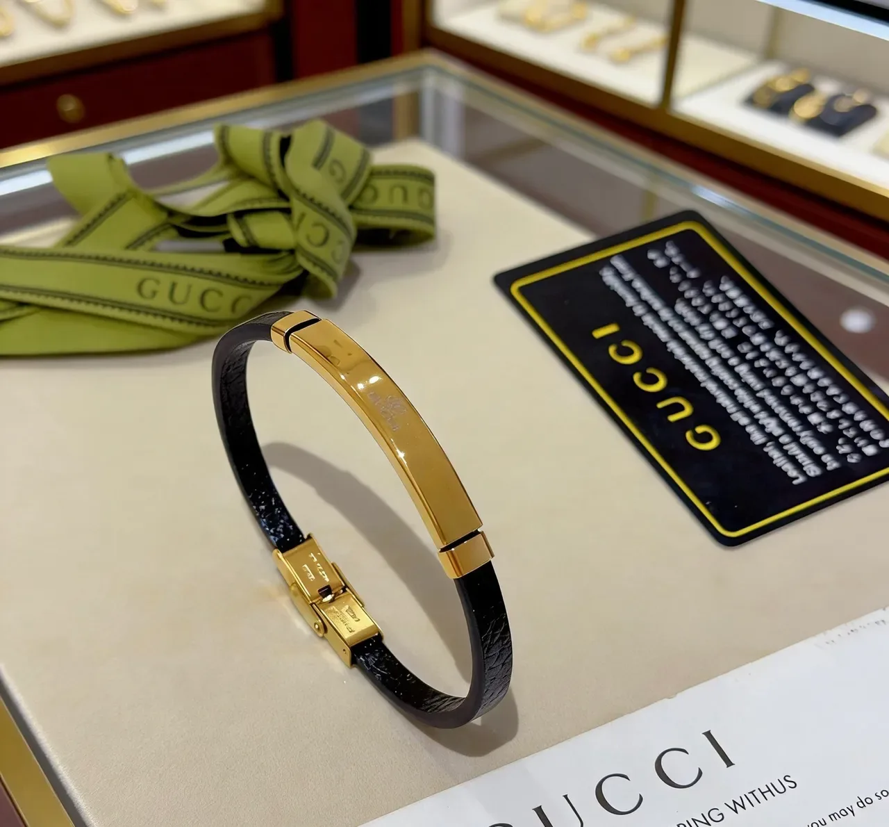 Gucci Black Leather and Gold-Tone Metal Bracelet 9