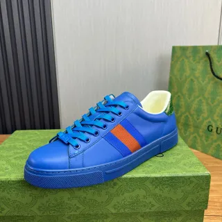 Gucci حذاء رياضي أسلوب حياة باللون الأزرق والبرتقالي النابض من الجلد العلوي تفاصيل الشريط الشبكي