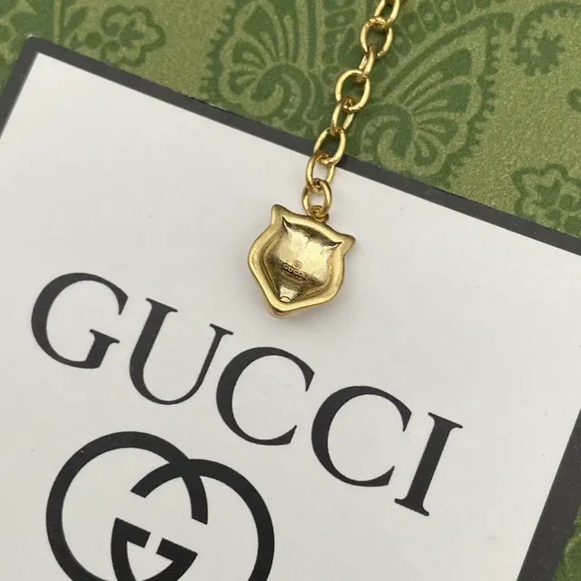 Gucci GG Marmont Bracelet à breloques florales et tigre doré 2
