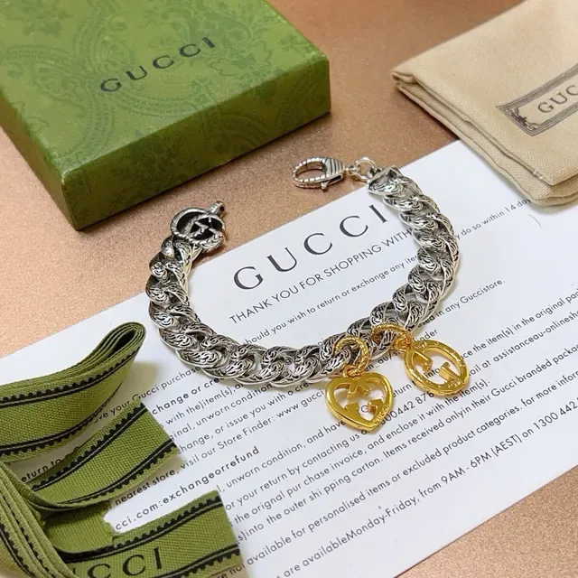 Gucci GG Marmont Bracelet Chaîne Curb Argent et Or avec Maillons Scrollwork Ornés 9