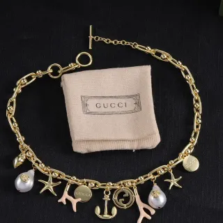 Gucci Gold Beige Link Chain Multi-Charm Pendant Necklace