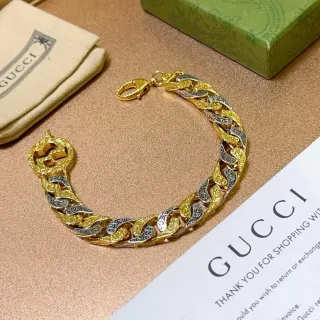 سوار Gucci سلسلة كيرب ثنائية اللون ذهبية وفضية نقش أنماط الأوراق