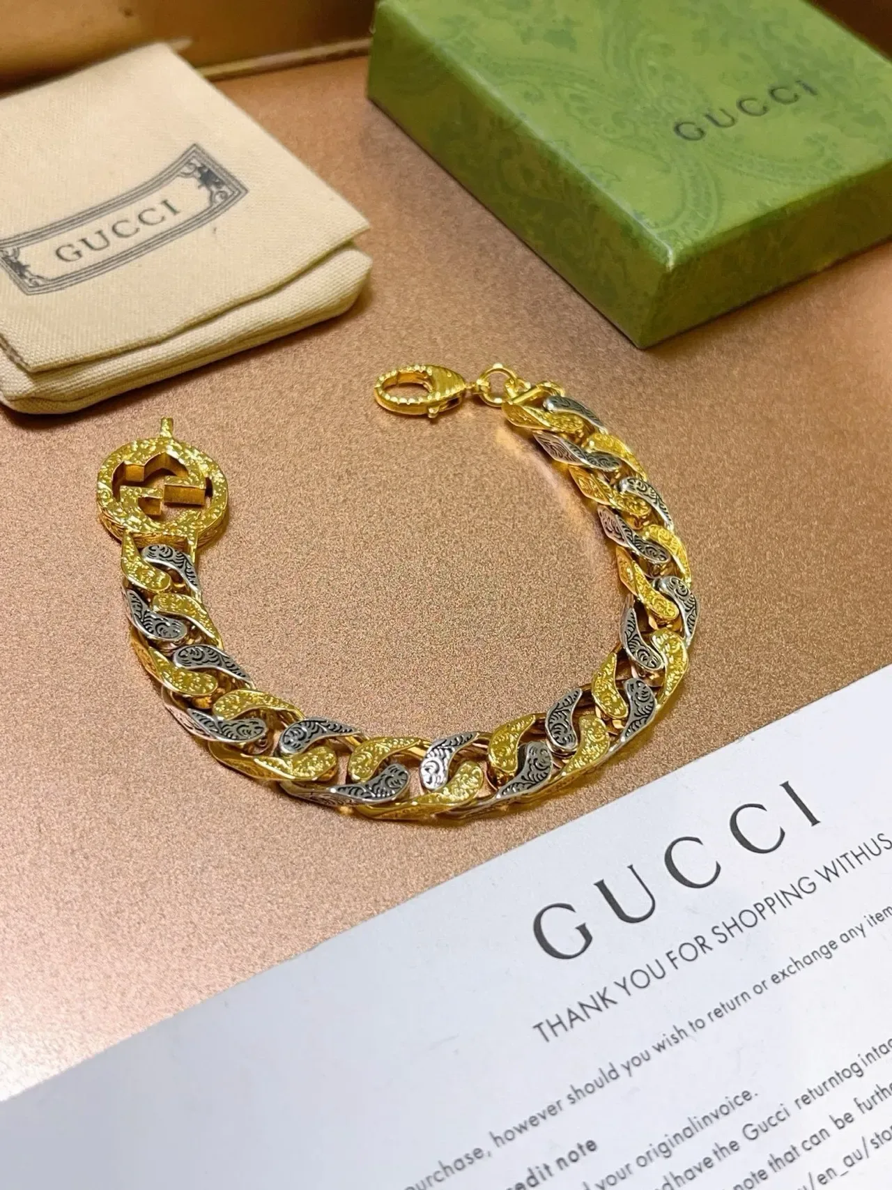 سوار Gucci سلسلة كيرب ثنائية اللون ذهبية وفضية نقش أنماط الأوراق 6