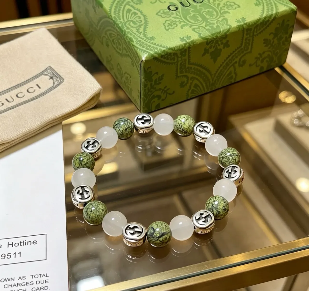 Gucci إسوارة خضراء بيضاء خرز interlocking G Charms 3