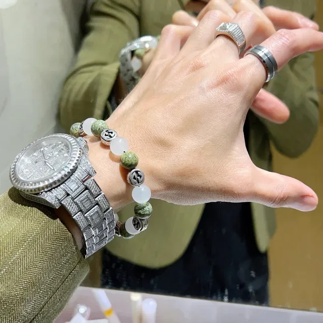 Gucci إسوارة خضراء بيضاء خرز interlocking G Charms 7