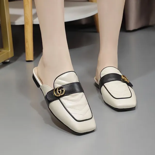 Gucci Horsebit 1955 Loafers matelassés crème et noir 9