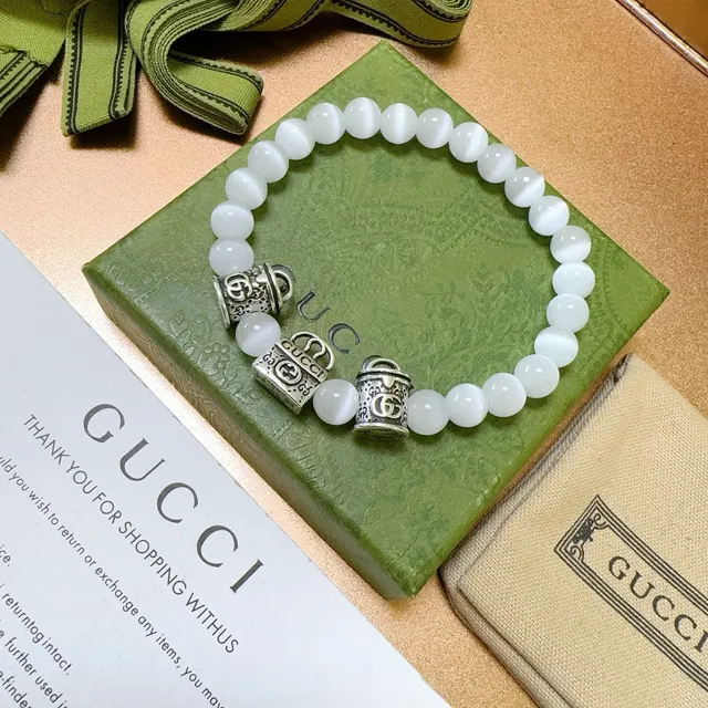 Gucci White Cat's-Eye Bead and Interlocking G Charm Bracelet 9