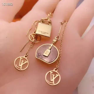 Louis Vuitton Asymmetrical Monogram Lock Motif Gold-Tone Earrings