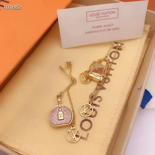 Louis Vuitton Asymétriques Motif Monogram Lock Doré Boucles d'oreilles 7