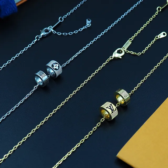 Louis Vuitton Gold Chain Asymmetrical Pendant Layout Necklace 8